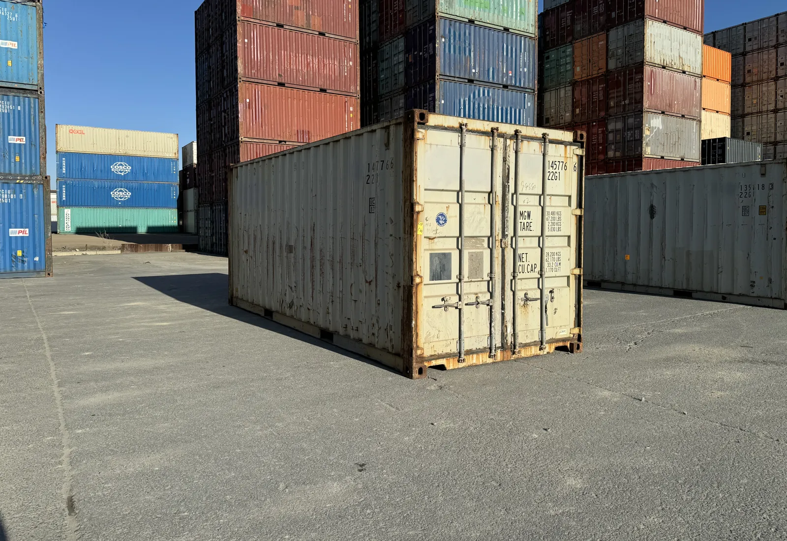 Used cargo-worthy 20ft shipping container with typical surface wear